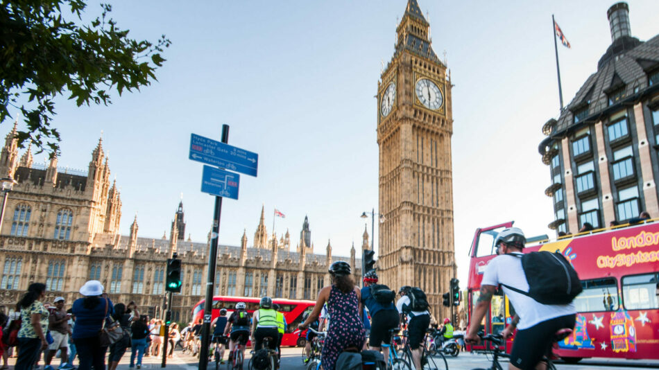 People cycling in Westminster on cycle lane (cycle superhighway)