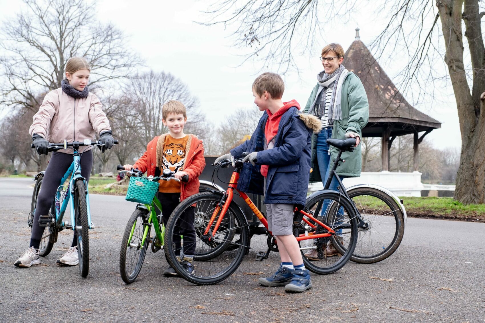 Woman with children in cargo bike