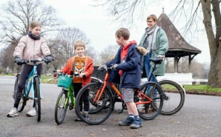 Woman with children in cargo bike