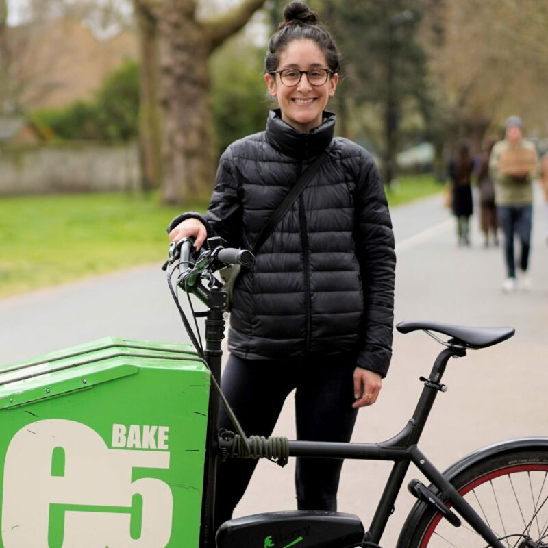 Woman with green cargo bike