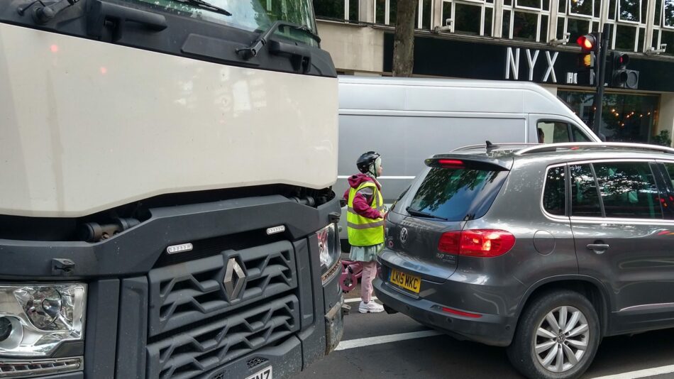 Person cycling near lorry at dangerous junction