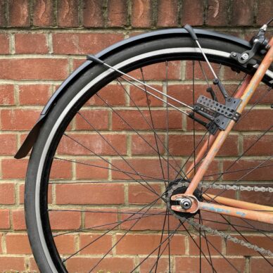 Close up shot of a rear clip-on mudguard on a bike