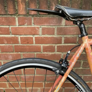 Snap on Ass Saver mudguard fitted to a bike saddle