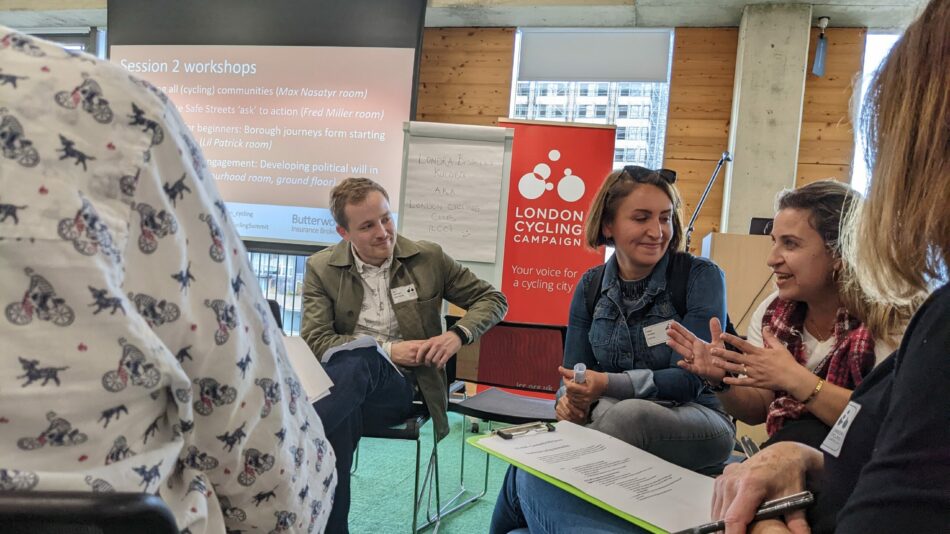 Women discussing in summit workshop session event