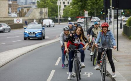 People on cycle lane (cycle superhighway) smiling