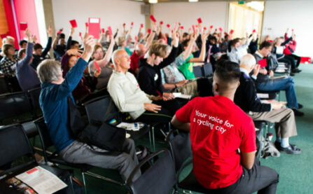 People at LCC AGM event voting