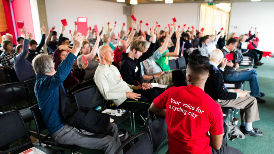 People at LCC AGM event voting