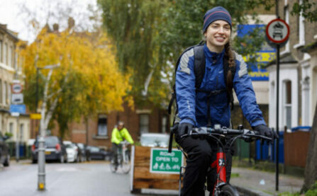 Low Traffic Neighbourhood (LTN) woman cycling through
