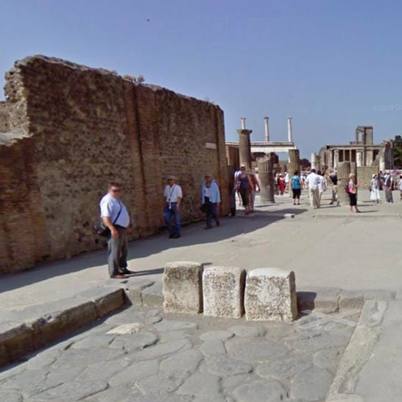 Roman road Pompeii with traffic bollards